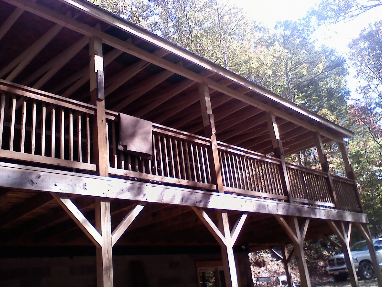 Timber framing under a new elevated porch and deck — Roof Leak Repair in Dubuque by Roofing Brothers